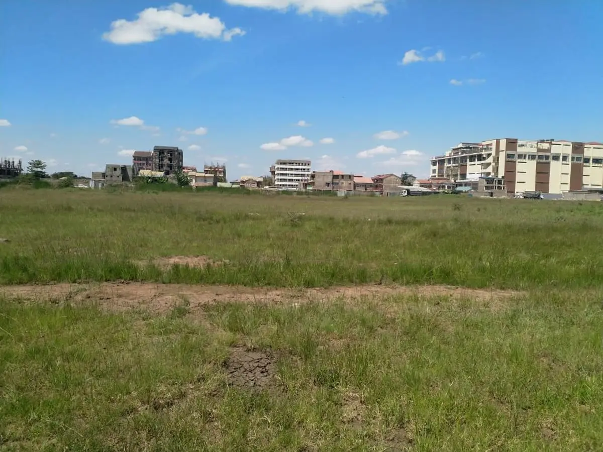 2.5 ACRES BEHIND NIBS COLLEGE AND SPUR MALL.