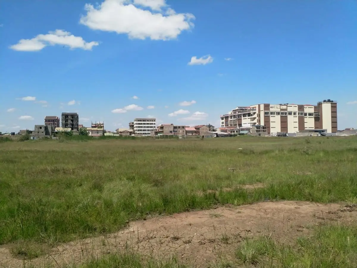 2.5 ACRES BEHIND NIBS COLLEGE AND SPUR MALL.
