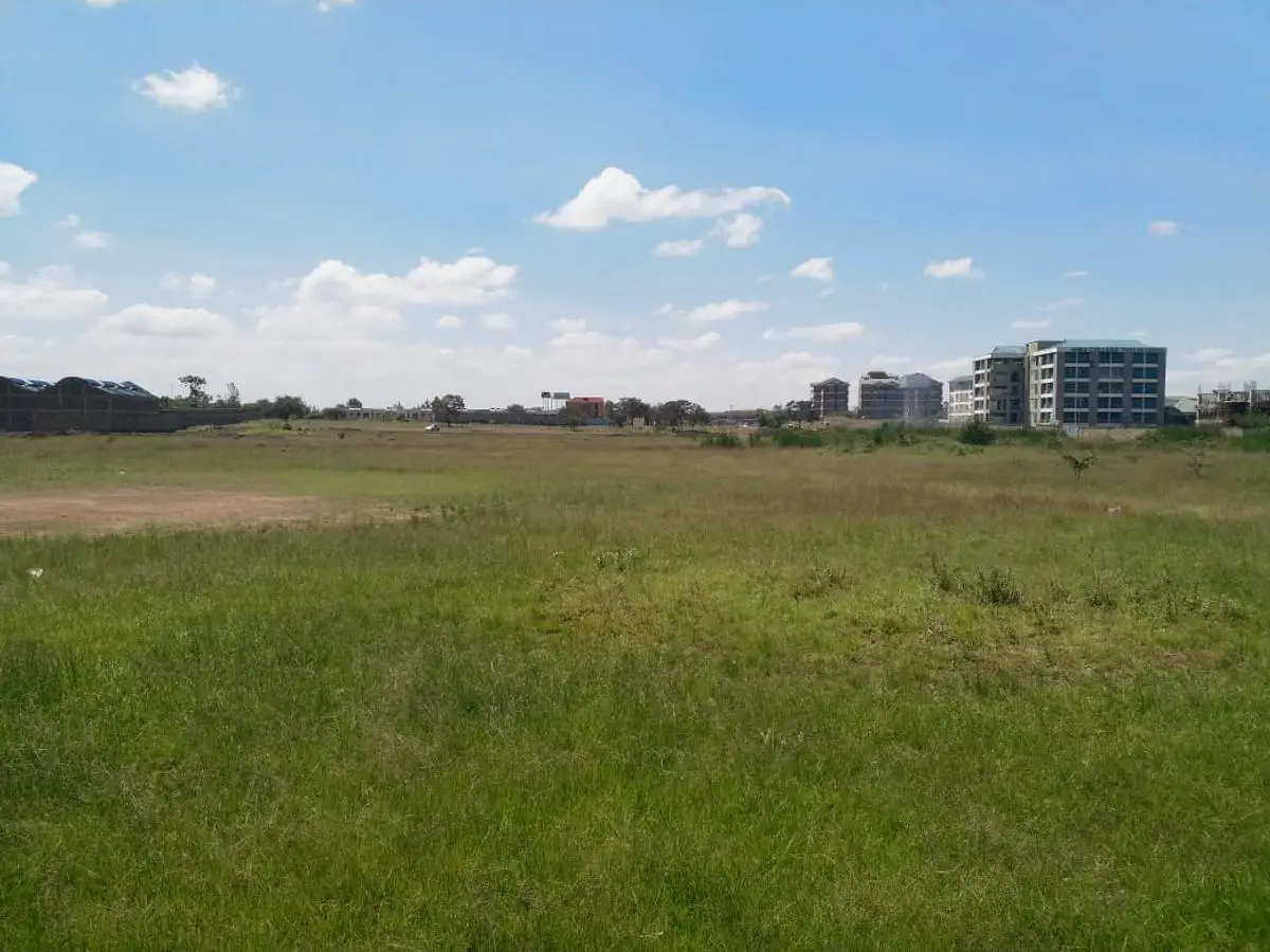 2.5 ACRES BEHIND NIBS COLLEGE AND SPUR MALL.