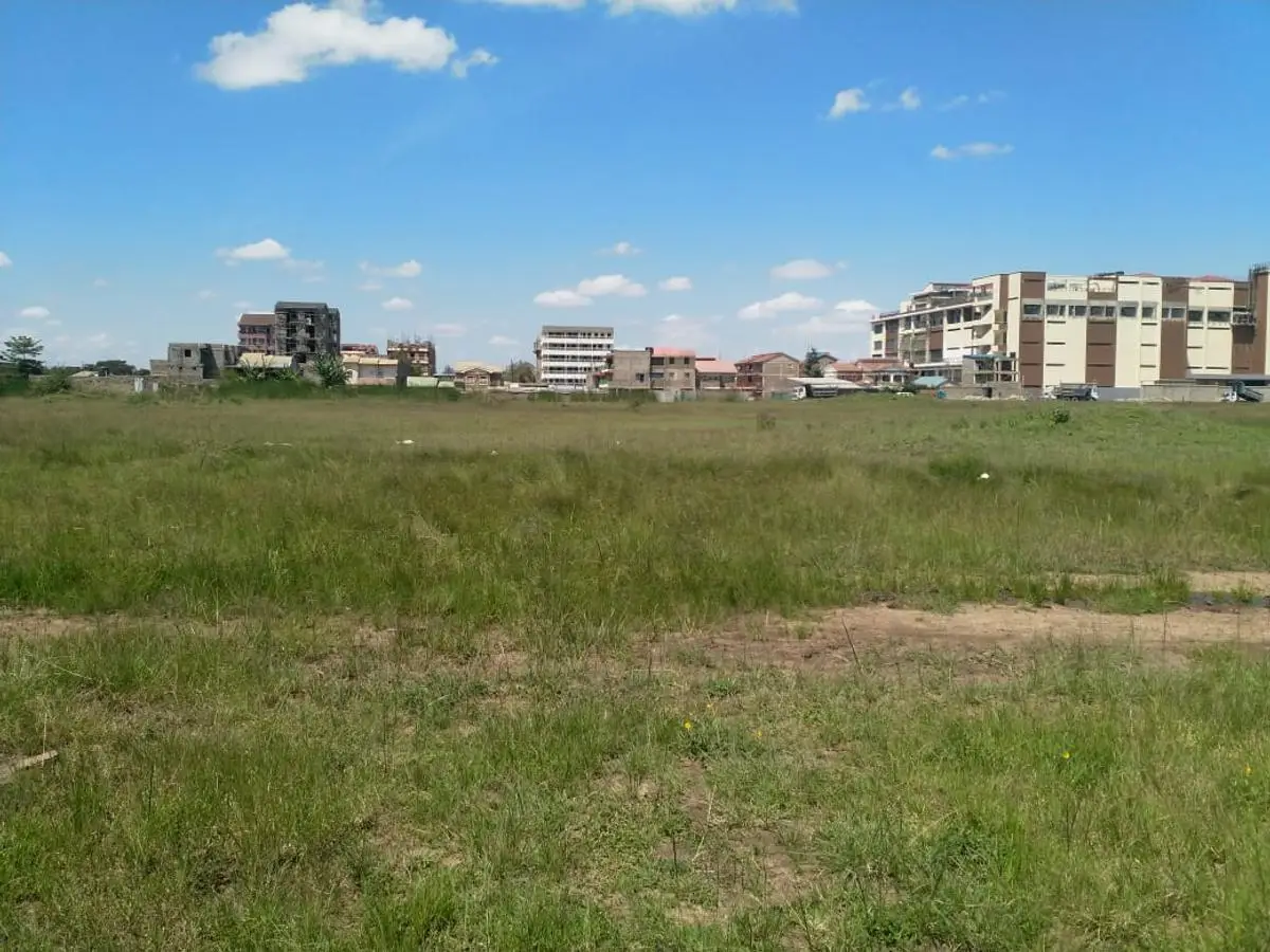 2.5 ACRES BEHIND NIBS COLLEGE AND SPUR MALL.